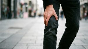 A person suffering with knee pain